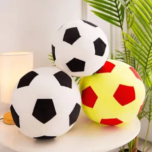 Soccer ball plush throw pillow set in black white and yellow red designs for sports fans