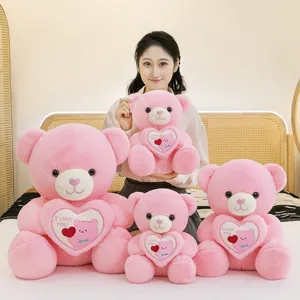 Set of four pink teddy bears holding I Love You hearts for Valentine's Day gifts.