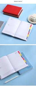Vue macro détaillée de l'agenda quotidien A5 avec des onglets d'indexation colorés