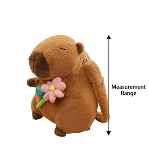Cute and soft brown capybara plush backpack with pink flower decoration for kids