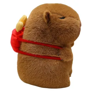 Soft brown capybara stuffed animal plush toy with a cute red backpack for kids