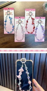 Close-up detail of colorful beaded phone chain with acrylic flower charms for phone case.