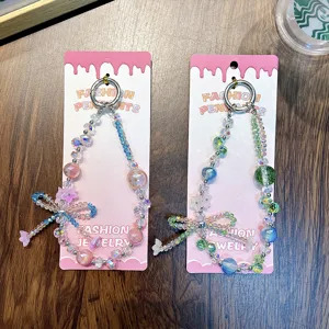 Handmade beaded flower phone charms and keychains with iridescent crystal beads