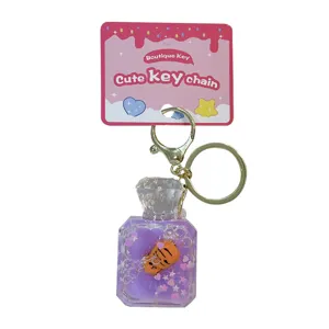 Purple oil-filled perfume bottle keychain with a cute tiger and glitter pendant