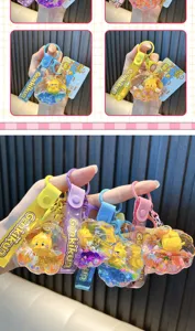 Detailansicht der Genkikun-Enten-Schlüsselanhänger aus Acryl mit Ölfüllung in verschiedenen Farben