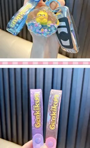 Detailaufnahme von Genkikun Muschel-Schlüsselanhänger mit bunten Silikon-Handschlaufen.