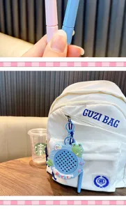 Nahaufnahme eines blauen Frosch-Magnetperlen-Zeichenbrett-Schlüsselanhängers am Rucksack
