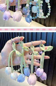 Cute fabric tulip beaded phone charm and stylish bag pendant with ribbon and colorful crystals.