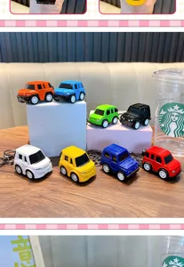 A vibrant collection of miniature alloy pull-back SUV car keychains in multiple colors