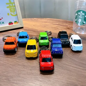 Colorful alloy pull-back mini car keychains for students, versatile backpack pendant toys