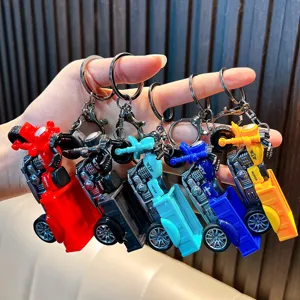 Simulation pull-back tricycle model toy keychains in five vibrant colors held in hand