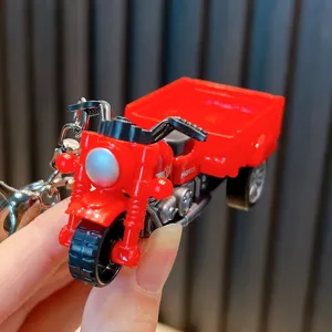 Red miniature pull-back tricycle model keychain toy with agricultural freight design