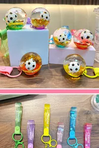 Detail of fluid soccer keychains in various colors with glitter and decorative straps.