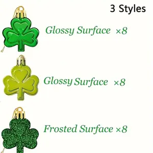 Close-up of three green shamrock ornament styles including glossy and frosted finishes