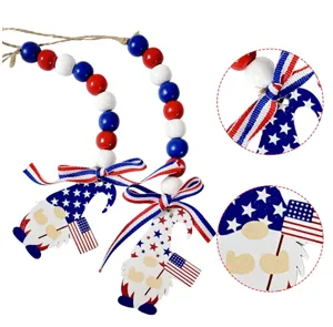 Detail view of Independence Day wood bead garland with patriotic gnome pendants