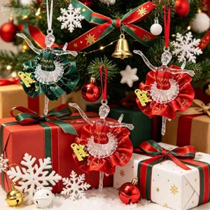 Detailed shot of clear acrylic ballerina ornaments with red and green satin tutus
