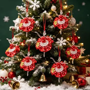 Acrylic ballerina Christmas ornaments on decorated tree with red polka dot skirts