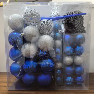Blue and silver Christmas ornament set with star tree topper and string lights in box