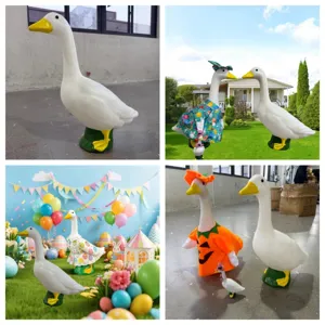 Large 22-inch white porch goose statue with various festive holiday outfits for garden decor