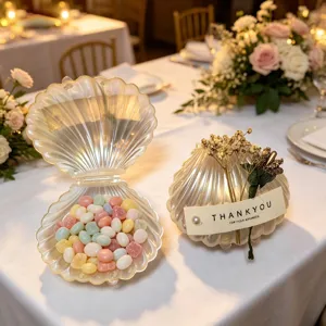 Eleganti scatoline a forma di conchiglia perlata per confetti e regali di matrimonio