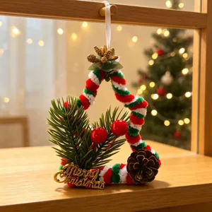 Close-up detail of handmade Christmas pipe cleaner ornament with Merry Christmas sign