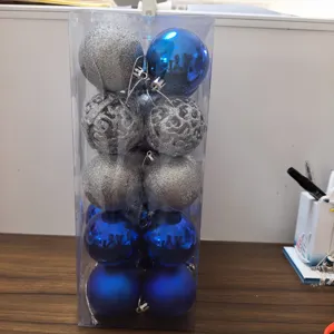 Set of festive blue and silver Christmas ball ornaments in a clear PVC display box