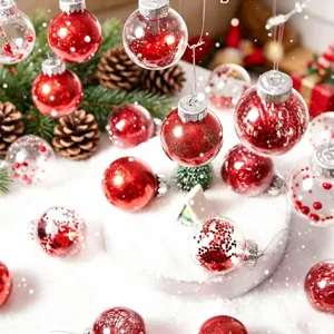 Close-up of 6cm red and clear PET Christmas baubles with glitter in a festive winter scene