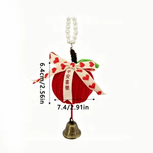 Handmade plush red apple Christmas ornament with bow, pearls, and bell decoration