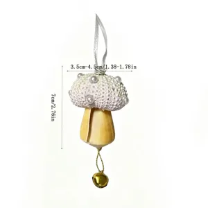 Handmade sea urchin shell mushroom ornament for Christmas tree decor with golden bell