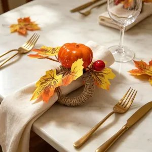 Thanksgiving simulation pumpkin napkin ring with maple leaves on elegant marble dining table