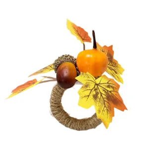 Thanksgiving pumpkin napkin ring with autumn maple leaves and acorn on white background.