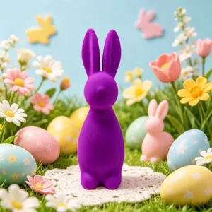 Purple minimalist Easter bunny figurine in a spring scene with colorful eggs and flowers