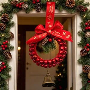 Decorative red bell Christmas wreath with ribbon bow and hanging brass bell for door