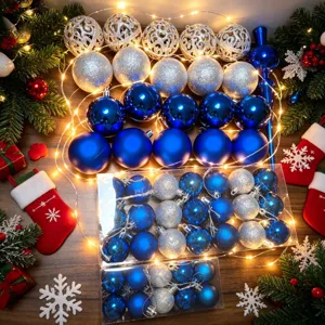 Complete festive set of blue and silver Christmas ornaments with warm LED fairy lights.