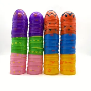Detailed close-up showing vibrant patterned fillable plastic Easter eggs in rows