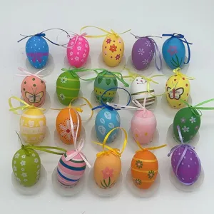 Macro view of colorful painted plastic Easter eggs featuring floral and butterfly patterns