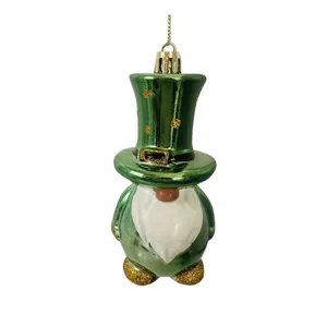 Sparkling green St. Patrick's Day gnome ornament with gold glitter hat details