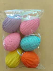 Set of six colorful embossed Easter eggs with hanging ribbons in clear packaging