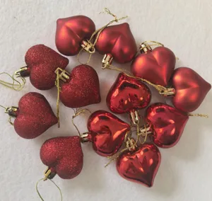 Set of 12 red heart ornaments with glitter, matte, and shiny finishes for Valentine's
