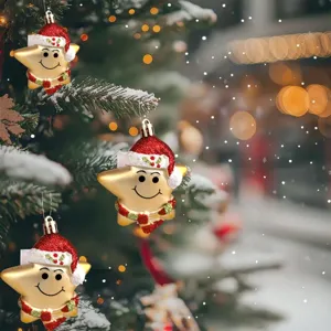3pcs cute smiling star ornaments with Santa hats on a snowy Christmas tree