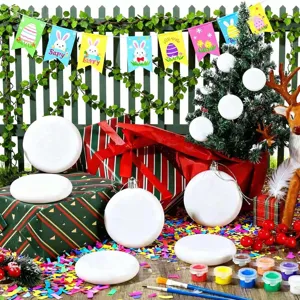 DIY paintable white flat round ornaments shown in a festive holiday garden scene