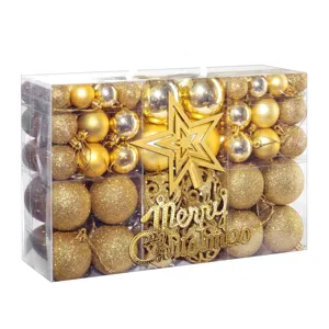 Detail view of 102pcs golden Christmas ornament set in transparent box with star topper
