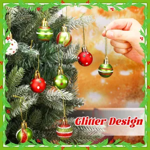 Detailed view of 3cm mini glitter Christmas ornaments on a festive holiday tree