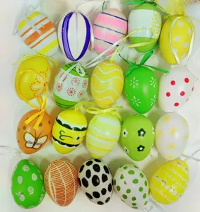 Detailed view of colorful hanging painted plastic Easter eggs with various patterns for party