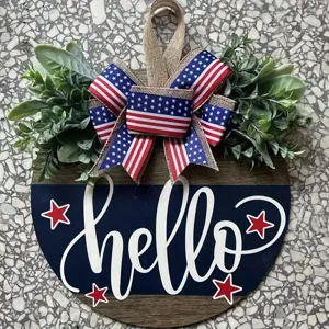 Patriotic wooden door hanger with hello greeting and American flag bow decoration