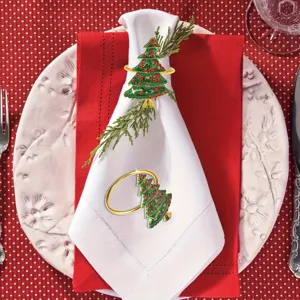 Servilleteros de árbol de Navidad en verde y dorado para decoración de mesa festiva.