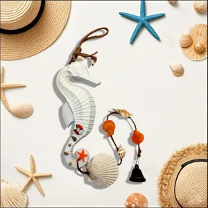 Detailed view of a white Mediterranean seahorse wind chime with shell and bell accents