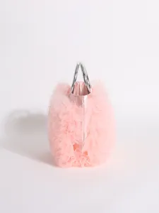 Elegant pink tulle ruffled handbag featuring sleek silver circular metal handles detail