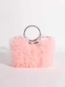 Detailed view of the soft pink ruffled tulle texture on this sweet style handbag.