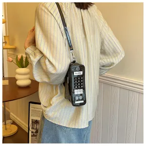 Detailed close-up of a creative retro mobile phone shaped shoulder bag for women